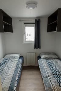 Llit o llits en una habitació de Olmenduin | Chalet 26 | Zeeland