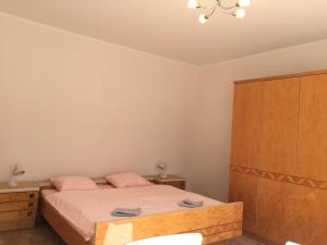 Giường trong phòng chung tại Willa Przy Plaży Gdynia Kamienna Góra