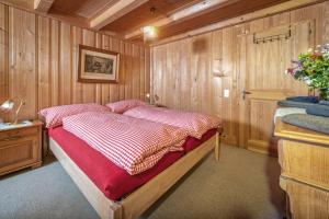 Letto o letti in una camera di BnB DeHeimelig