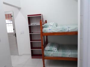 Postel nebo postele na pokoji v ubytování Ubatuba