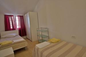 Postel nebo postele na pokoji v ubytování Apartment Carlitos