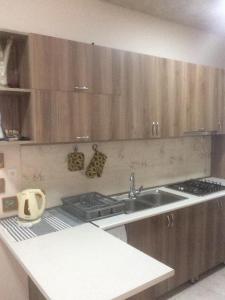 Kuchyň nebo kuchyňský kout v ubytování Room 4 U