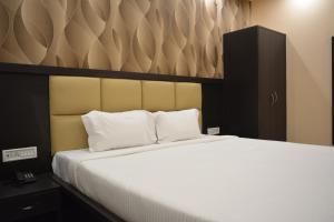Ένα ή περισσότερα κρεβάτια σε δωμάτιο στο Olive suites
