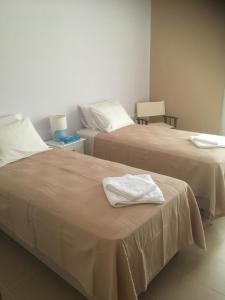Postel nebo postele na pokoji v ubytování Stellar Beachhouse