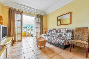 Телевизор и/или развлекательный центр в Playa De Las Americas Apartment