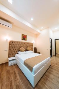 Ένα ή περισσότερα κρεβάτια σε δωμάτιο στο L'image Art Hotel