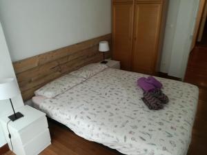 Łóżko lub łóżka w pokoju w obiekcie Marina La Concha