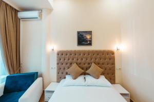 Ένα ή περισσότερα κρεβάτια σε δωμάτιο στο L'image Art Hotel