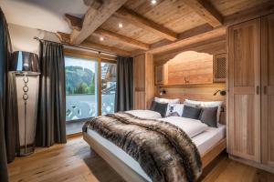 Posteľ alebo postele v izbe v ubytovaní Alpenhotel Plaza