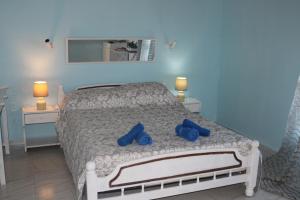 Postel nebo postele na pokoji v ubytování Madalenas B&B