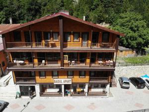 an aerial view of a large building with a balcony at Badul Apart in Uzungöl