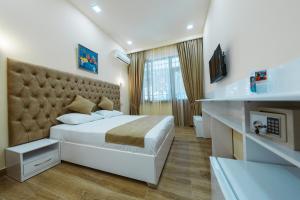 Postel nebo postele na pokoji v ubytování L'image Art Hotel