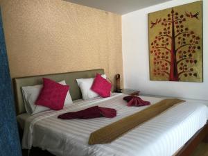 Krevet ili kreveti u jedinici u okviru objekta Paradise Resort Phi Phi