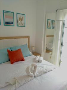 Łóżko lub łóżka w pokoju w obiekcie Seaview Fuengirola Apartment