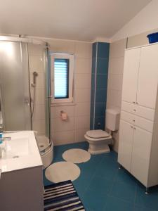 Koupelna v ubytování Apartment Ivo + 16 fotografií