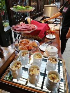 a buffet line with food on a table at Ombak Dive Resort Perhentian Island in Perhentian Islands