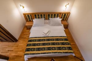 Postel nebo postele na pokoji v ubytování Felix Pension + 37 fotografií
