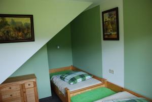 Posteľ alebo postele v izbe v ubytovaní Domek Na Wierchu i Apartament na Wierchu