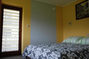Posteľ alebo postele v izbe v ubytovaní Domek Na Wierchu i Apartament na Wierchu