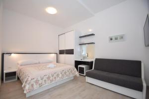 Postel nebo postele na pokoji v ubytování Apartment Anića Kuk
