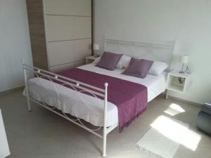 Posteľ alebo postele v izbe v ubytovaní Studio Apartment Luce