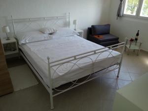 Posteľ alebo postele v izbe v ubytovaní Studio Apartment Luce