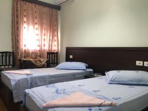 Tempat tidur dalam kamar di Guest House Simeone