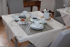 Příslušenství pro přípravu čaje a kávy v ubytování A DUE PASSI affittacamere - Ovaro + 13 fotografií