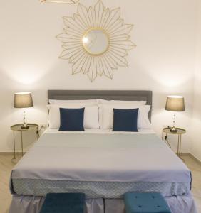 Posteľ alebo postele v izbe v ubytovaní Palazzo Spasiano rooms - SORRENTO CENTER