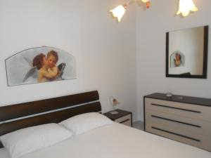 Ένα ή περισσότερα κρεβάτια σε δωμάτιο στο Casa Magnolia