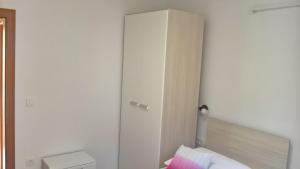 Postel nebo postele na pokoji v ubytování Apartman Zaklopatica