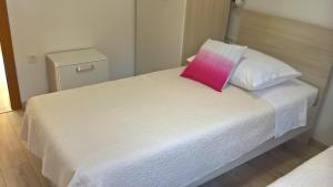 Postel nebo postele na pokoji v ubytování Apartman Zaklopatica