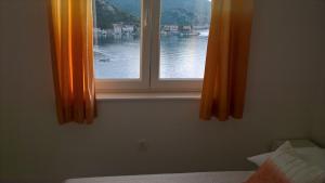 Postel nebo postele na pokoji v ubytování Apartman Zaklopatica