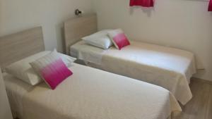 Postel nebo postele na pokoji v ubytování Apartman Zaklopatica
