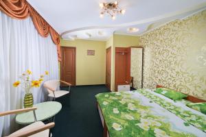 Postel nebo postele na pokoji v ubytování Hotel Hottey
