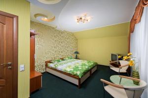 Postel nebo postele na pokoji v ubytování Hotel Hottey