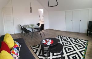 Posezení v ubytování Green Garden Plus Apartman