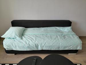 Postel nebo postele na pokoji v ubytování Green Garden Plus Apartman