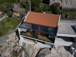 an overhead view of a house with an orange roof at Desconectate in Aldán
