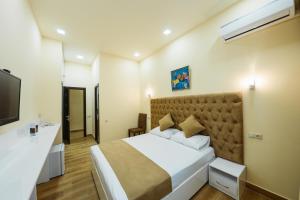 Postel nebo postele na pokoji v ubytování L'image Art Hotel