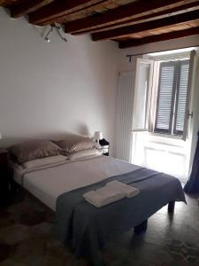 A bed or beds in a room at B&B Castellani