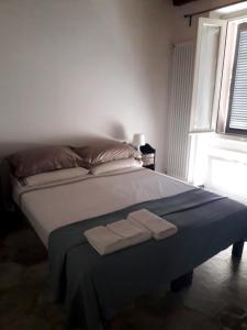 A bed or beds in a room at B&B Castellani