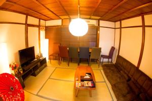 TV a/nebo společenská místnost v ubytování Moco hostel