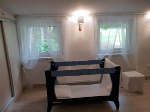 A bed or beds in a room at Levendula Nyaraló