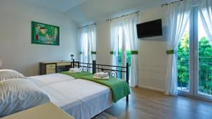 Katil atau katil-katil dalam bilik di Villa Lorena +40 gambar