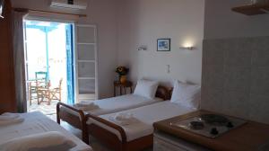 Postel nebo postele na pokoji v ubytování Hotel Hara + 24 fotografií