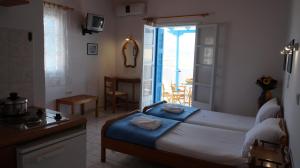 Postel nebo postele na pokoji v ubytování Hotel Hara