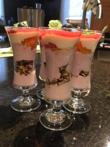 a couple of glasses filled with ice cream and fruit at Les Trois Erables Boutique Inn in Wakefield