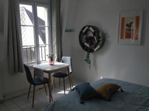 Katil atau katil-katil dalam bilik di Le petit studio honfleurais