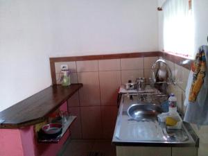 Η κουζίνα ή μικρή κουζίνα στο Casa Estilo Kitnet